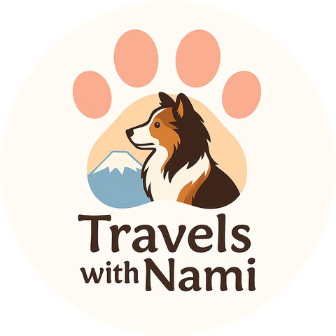Travels with Nami logo — a Sheltie in front of Mt. Fuji inside a paw print